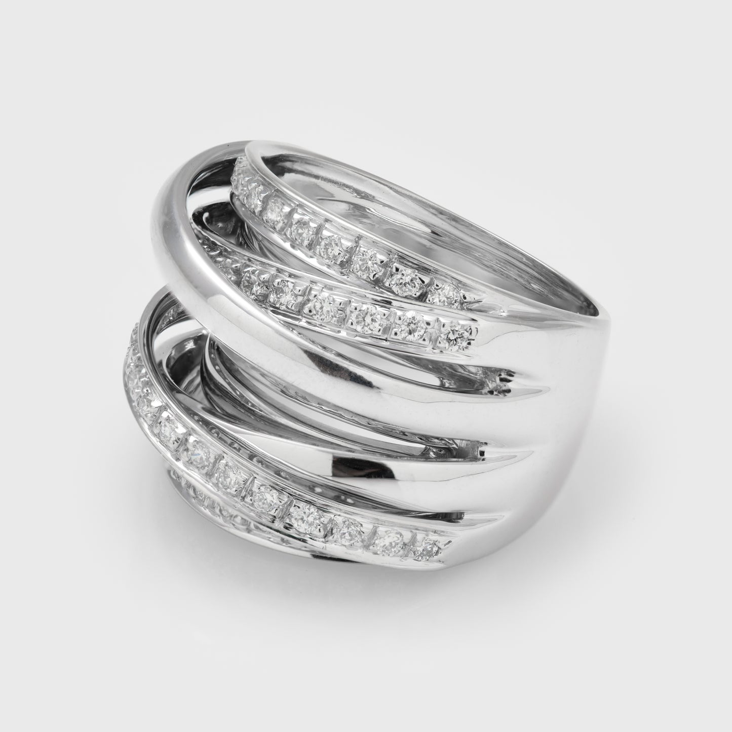 Close-up of a 14k white gold ring with diamonds.