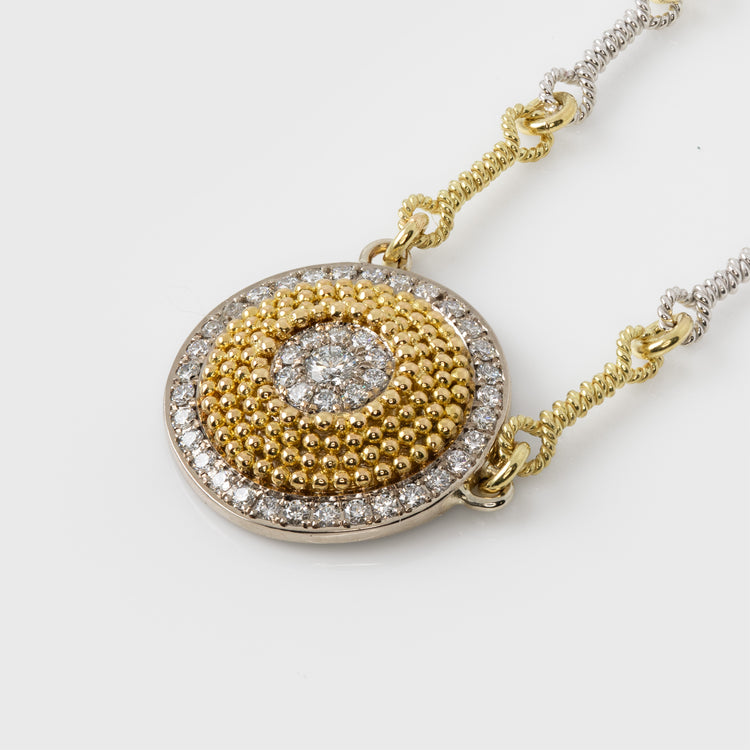 Gold and diamond necklace on a white background