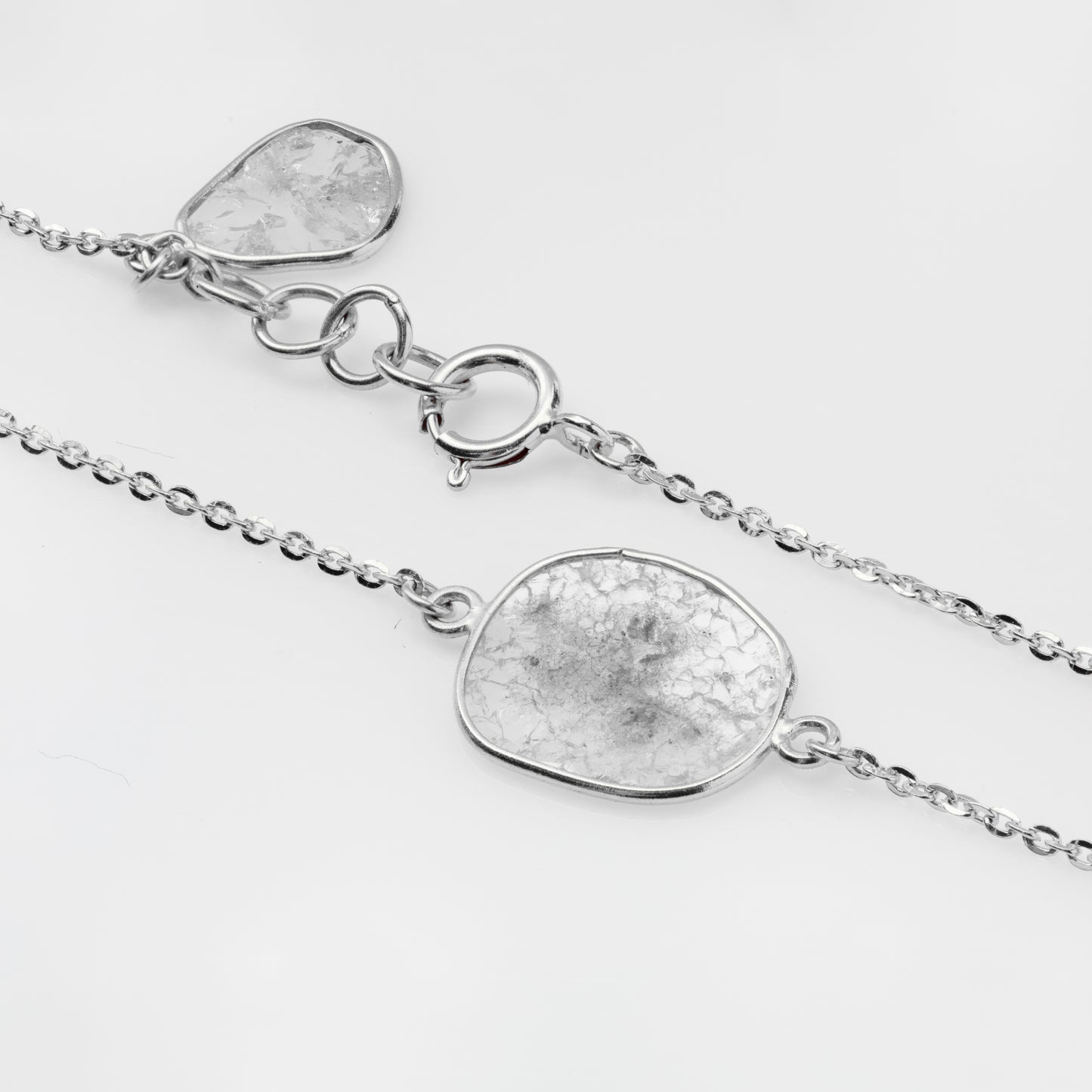 Close-up of a diamond slice bracelet featuring 18k gold and diamond slices.