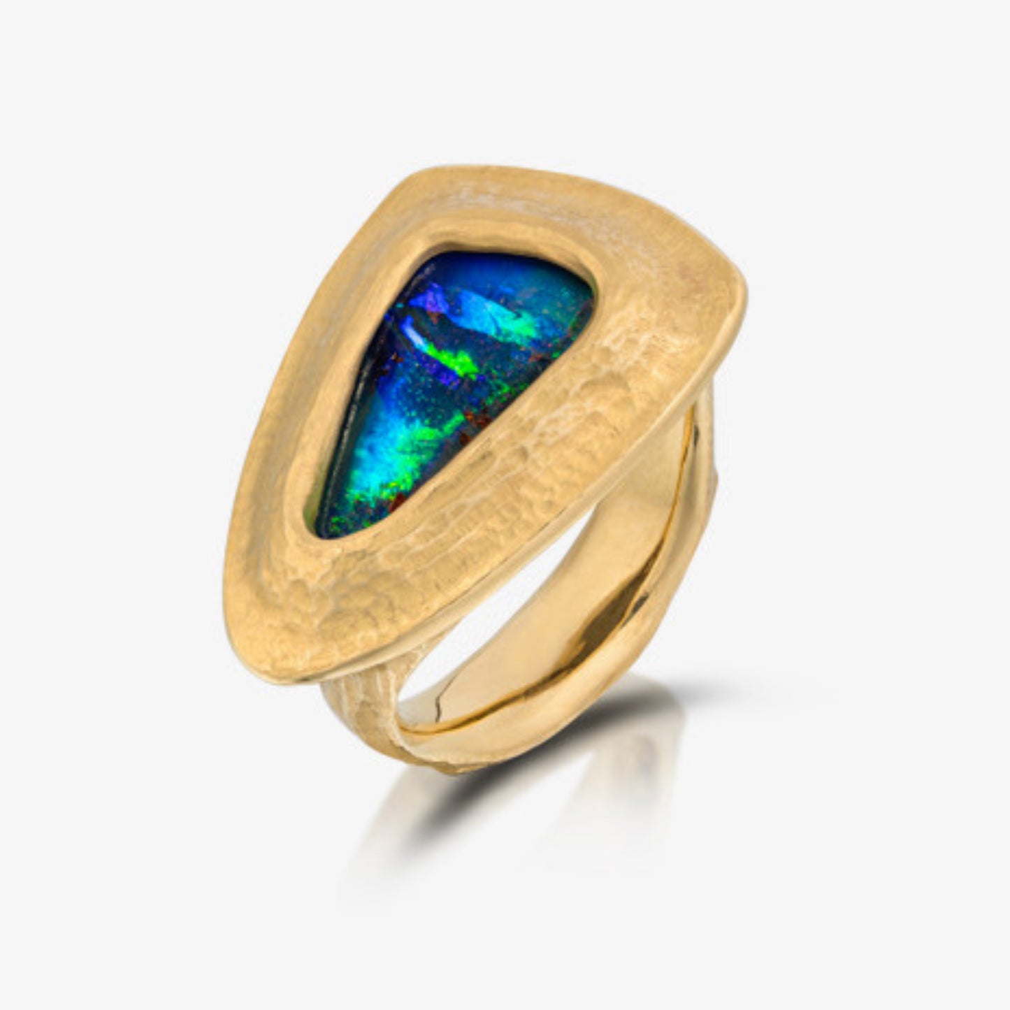 A men's gold ring featuring a boulder opal doublet gemstone set in a yellow gold band with small diamond accents.