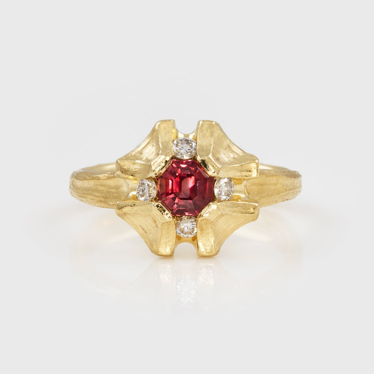 Flower shaped gold ring with pink sapphire
