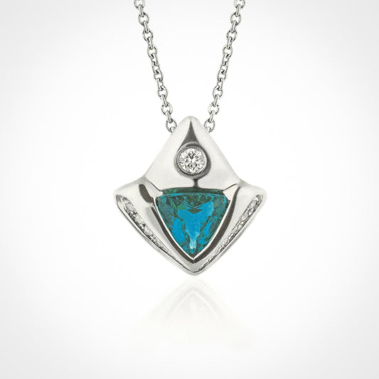 A platinum necklace with a trillion-cut Paraiba Tourmaline gemstone and diamond accents.