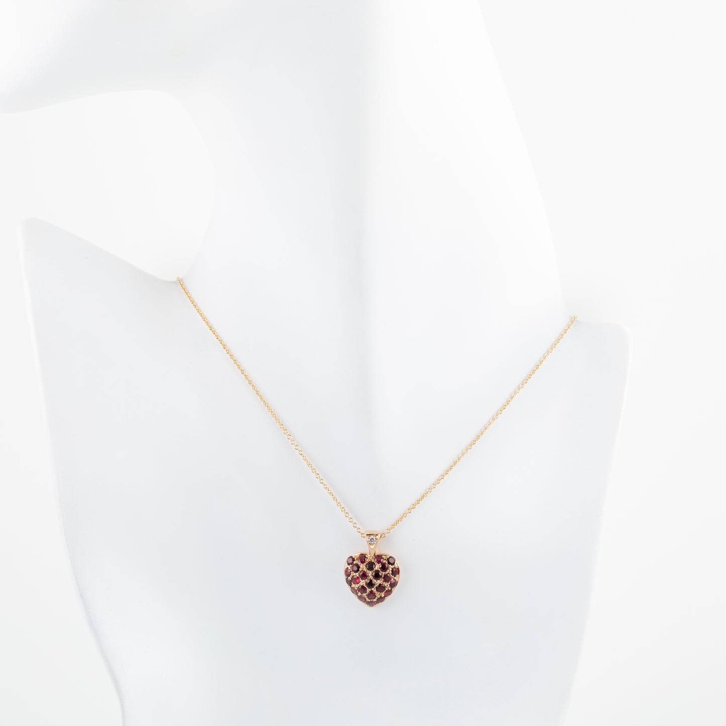 Necklace with a heart-shaped pendant on a white background