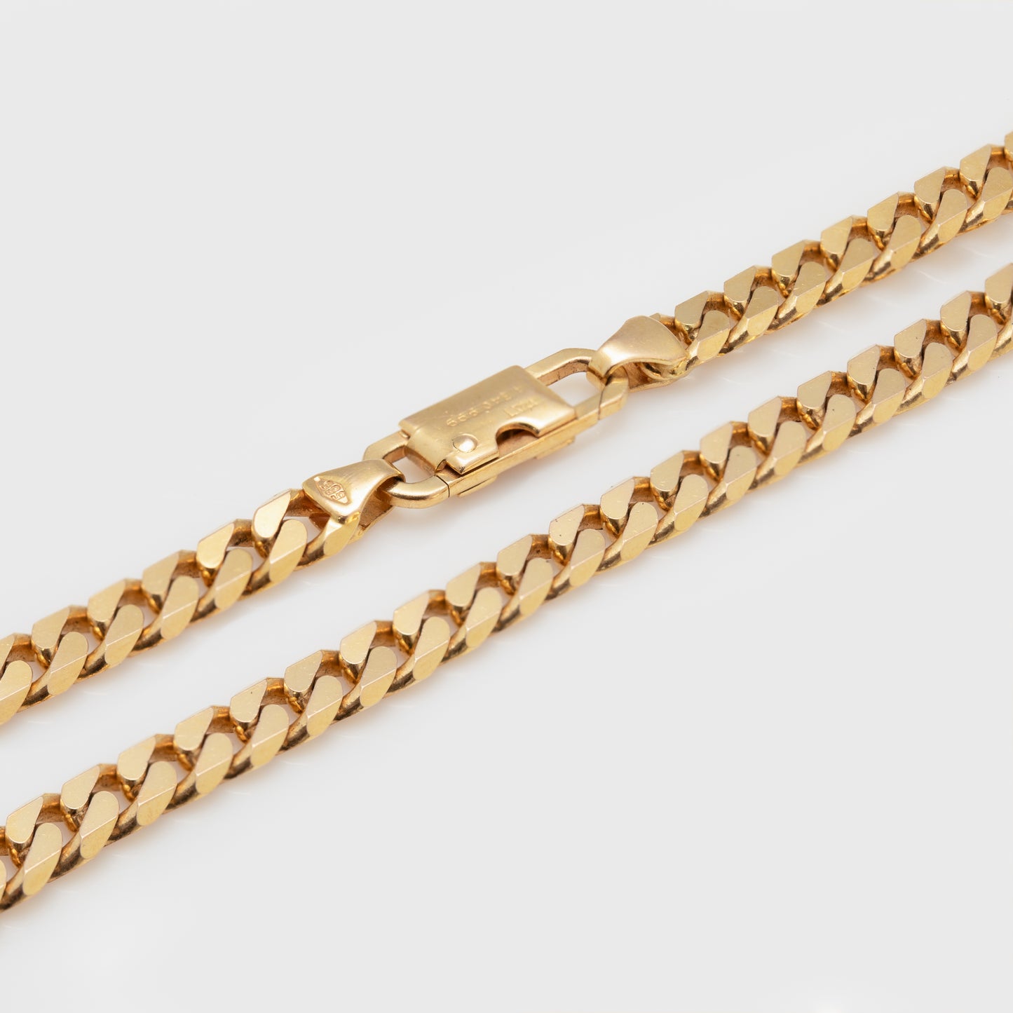 Close-up of a 14k yellow gold chain.