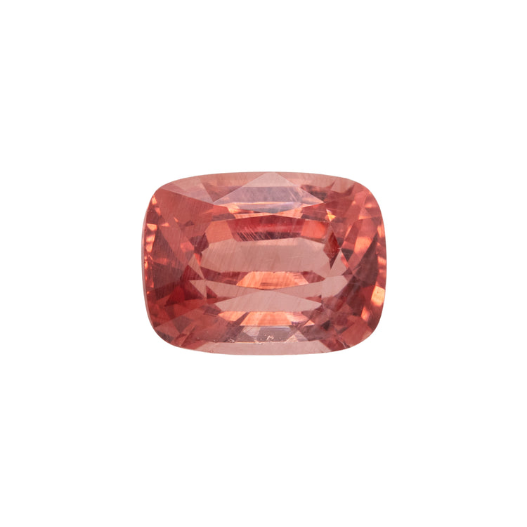 Red gemstone on a white background