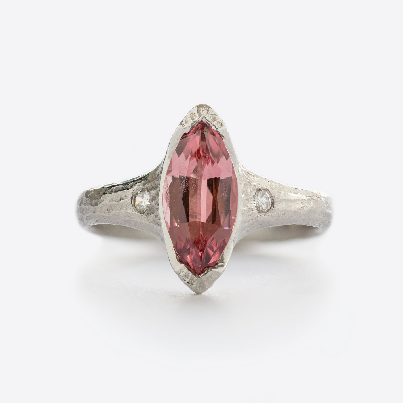 White metal ring with pink and white gems