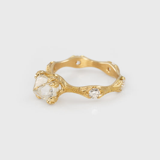 Gold ring with diamonds side view