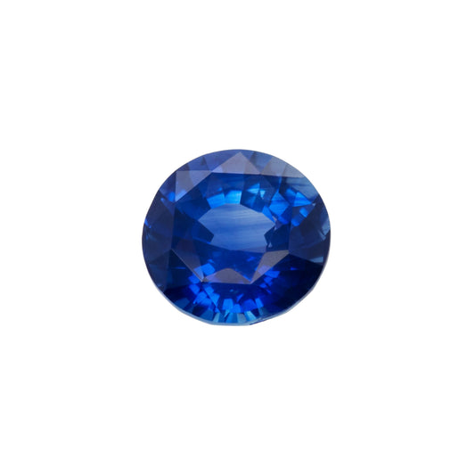 Faceted blue gemstone on a white background