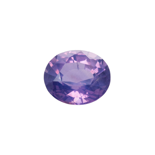 Purple gemstone on a white background