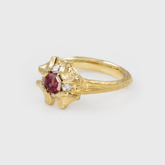 Flower shaped gold ring with pink sapphire 3/4 view