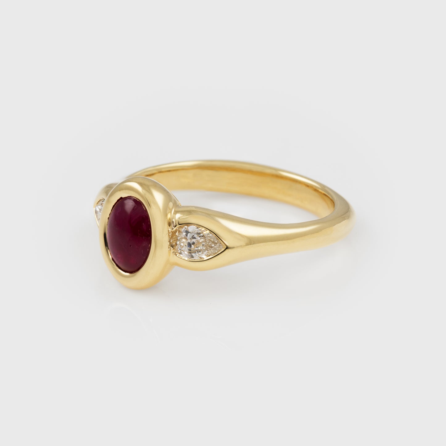 Gold ring with ruby and diamonds side view