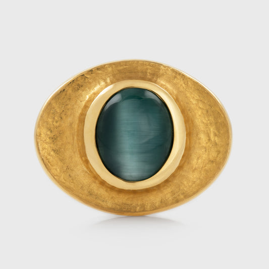 Yellow gold ring featuring bezel set blue green Cat's Eye Tourmaline