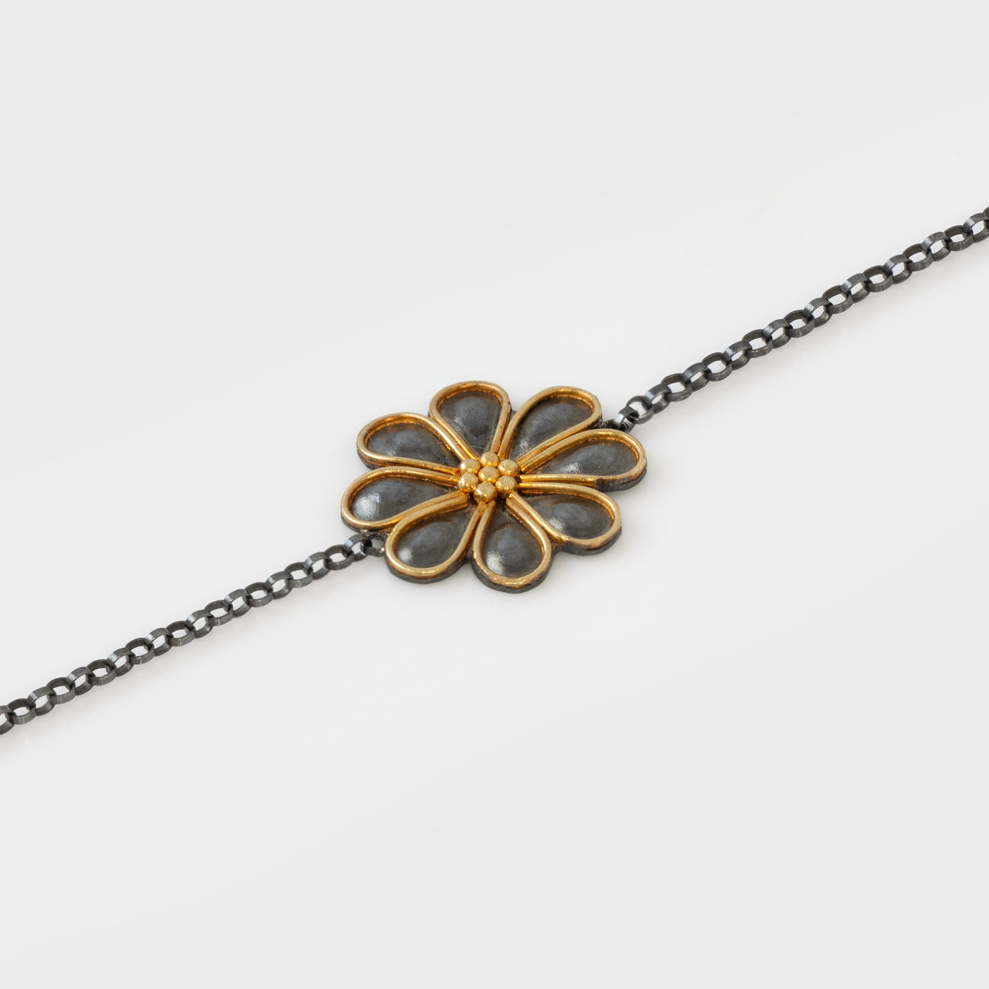 Bracelet with a flower motif on a white background