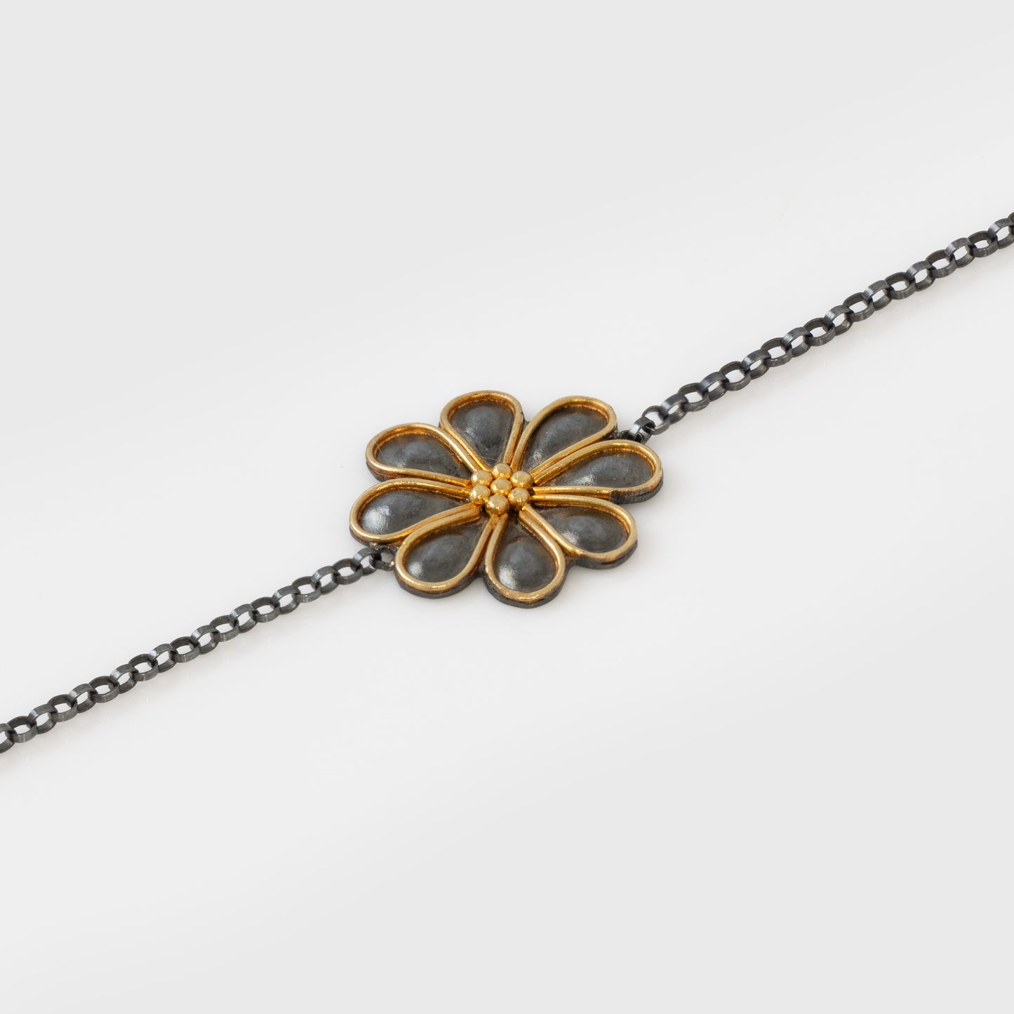 Bracelet with a flower motif on a white background