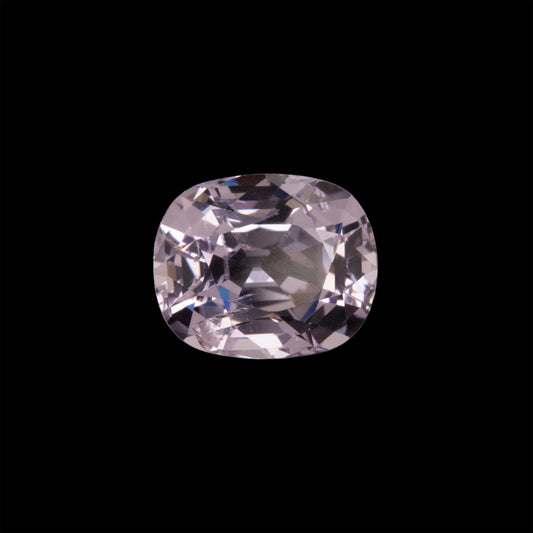 Cushion-cut pink spinel gemstone on a black background
