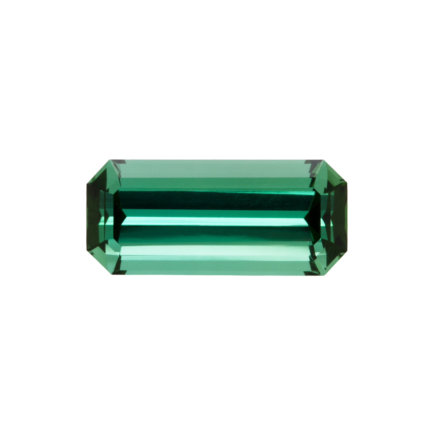 Green gemstone on a white background