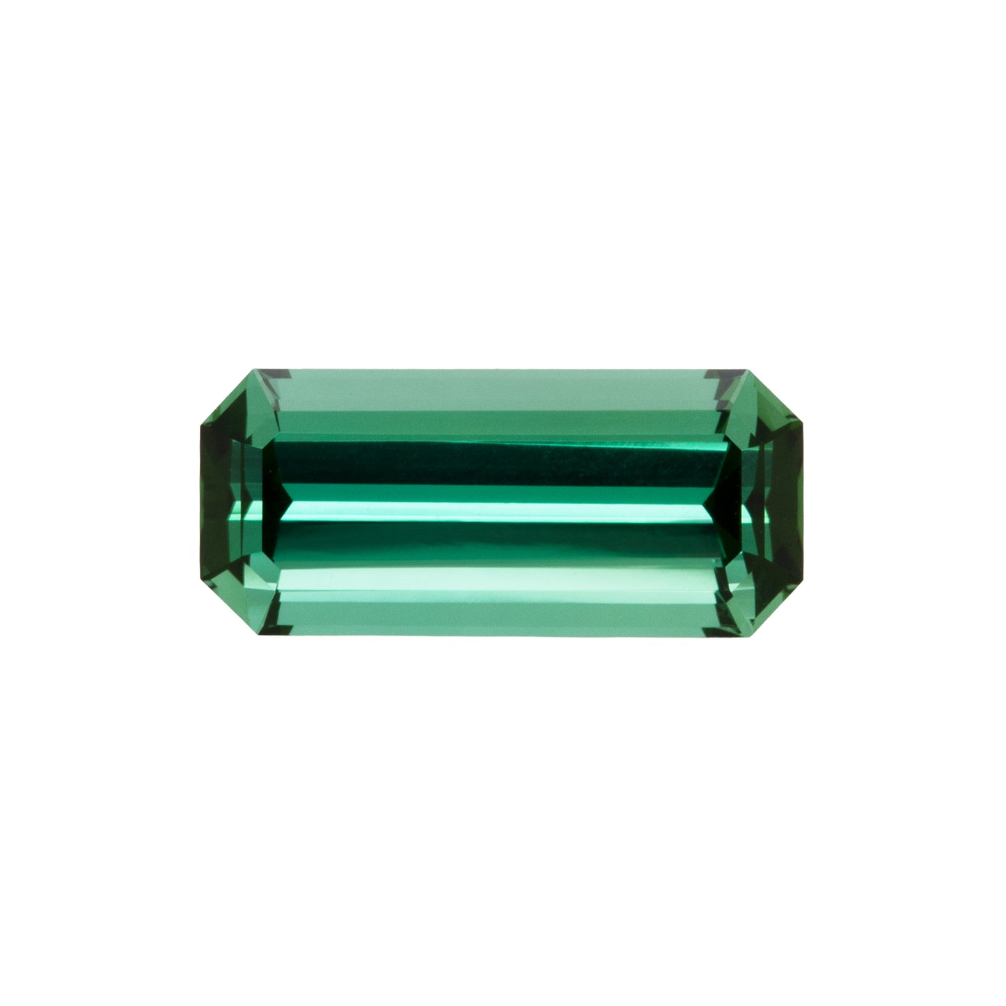 Green gemstone on a white background