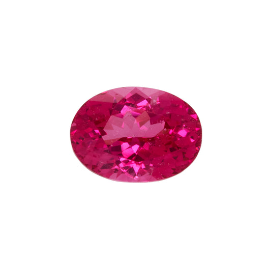 Red gemstone on a white background.