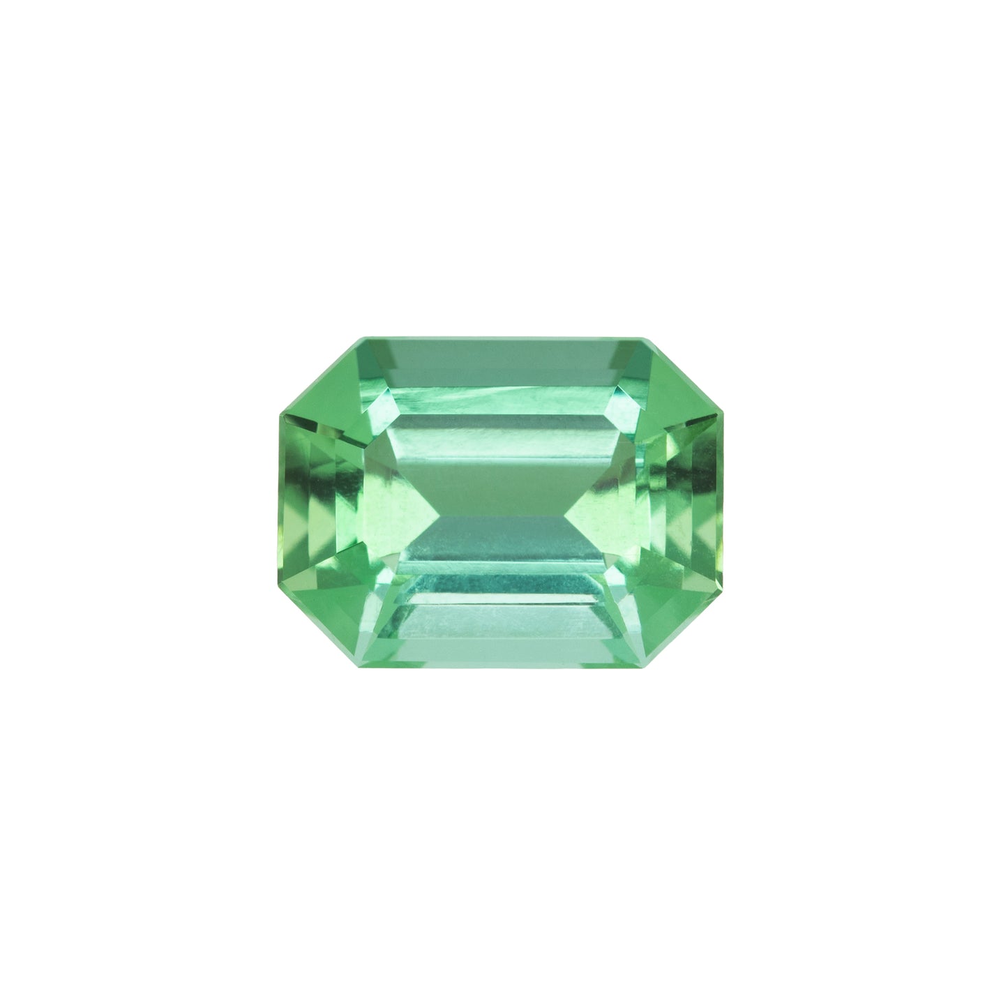 Green gemstone on a white background
