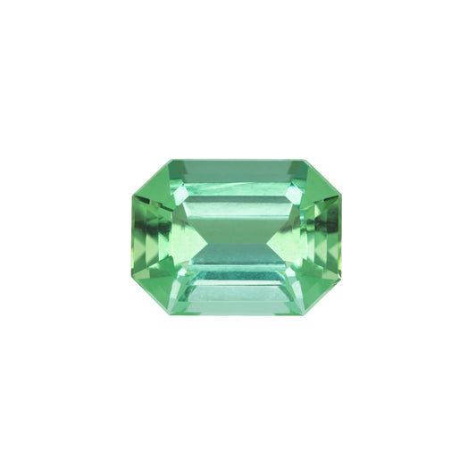 Green gemstone on a white background