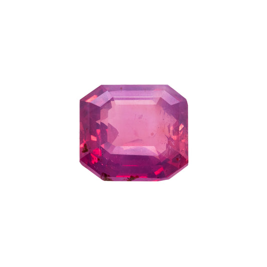 Pink gemstone on a white background