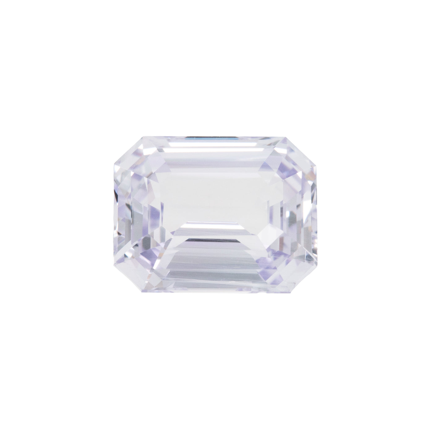 Clear violet gemstone on a white background