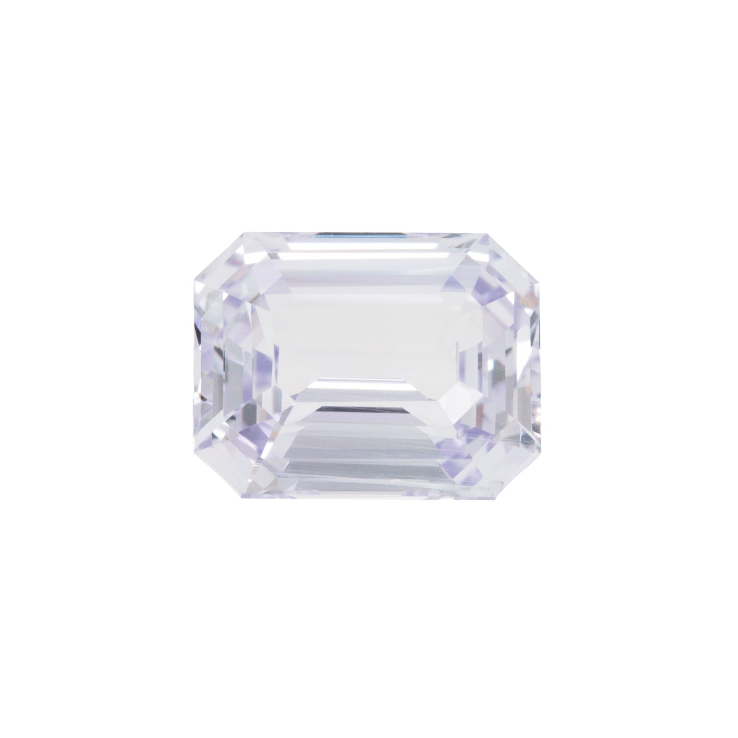 Clear violet gemstone on a white background