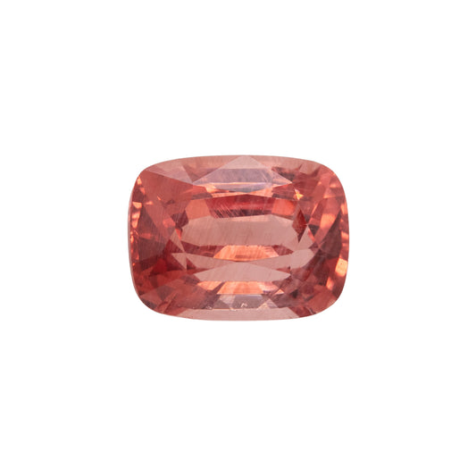 Red gemstone on a white background