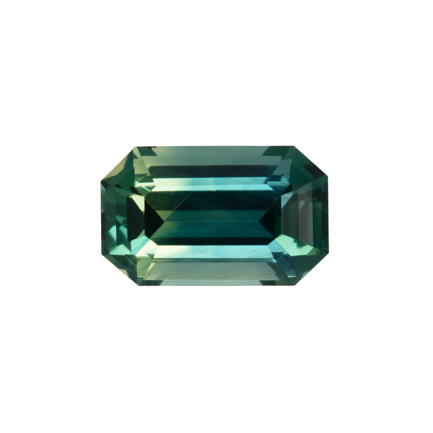 Green gemstone on a white background
