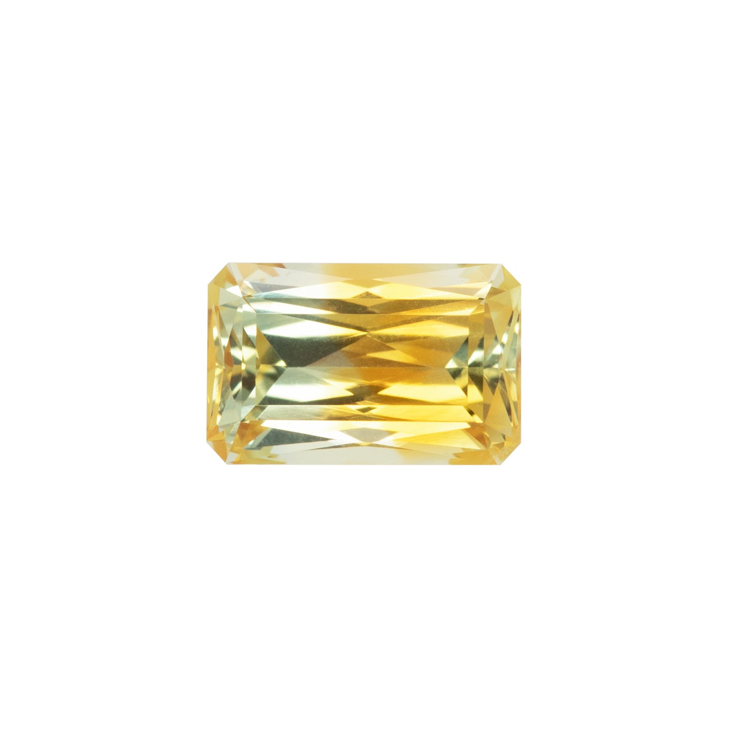 Yellow sapphire gemstone on a white background