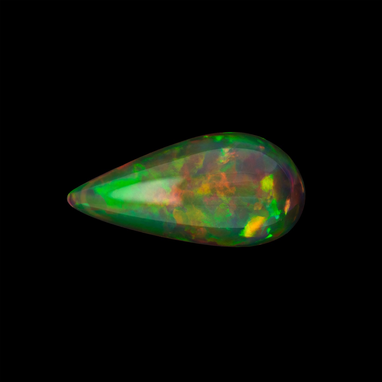 Teardrop-shaped opal gemstone on a black background