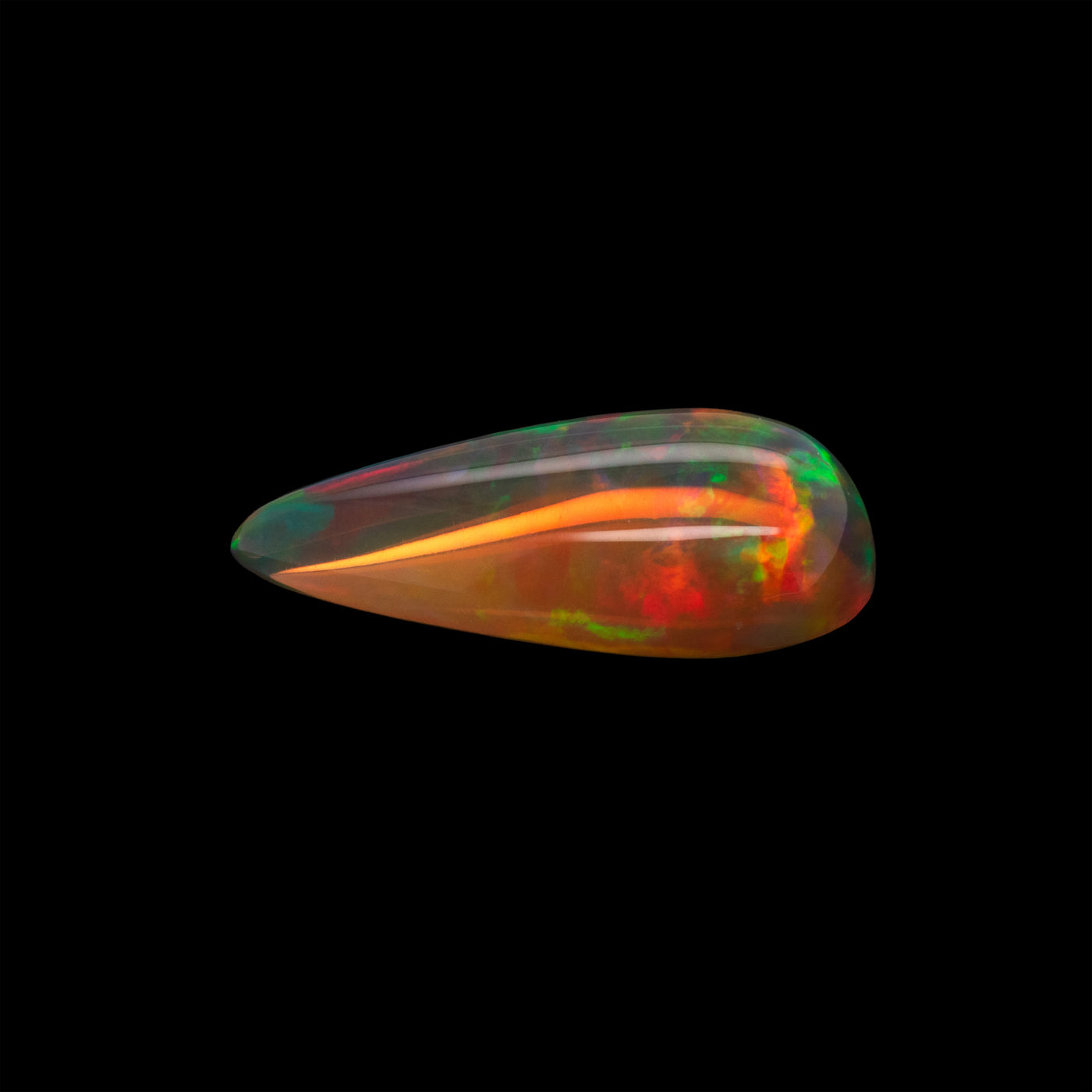 Colorful opal stone on a black background