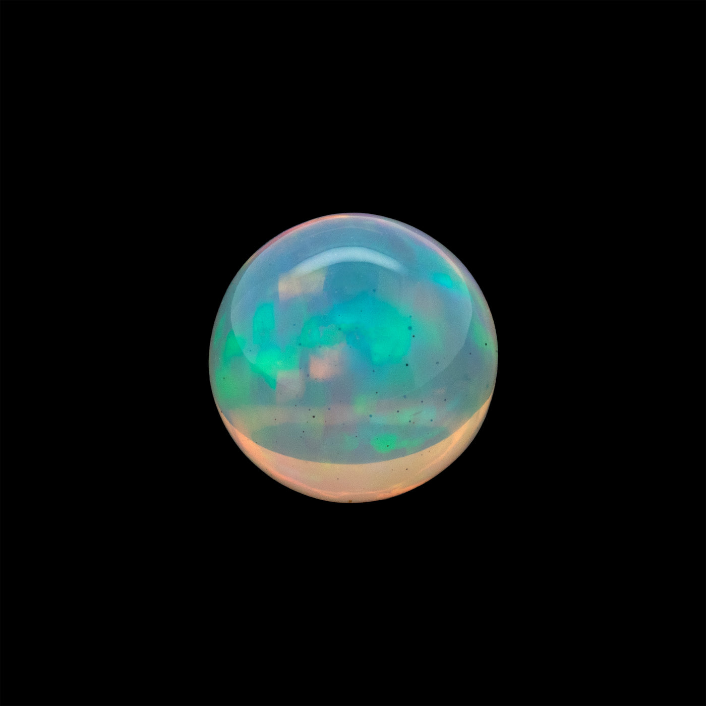 Multicolored opal gemstone on a black background