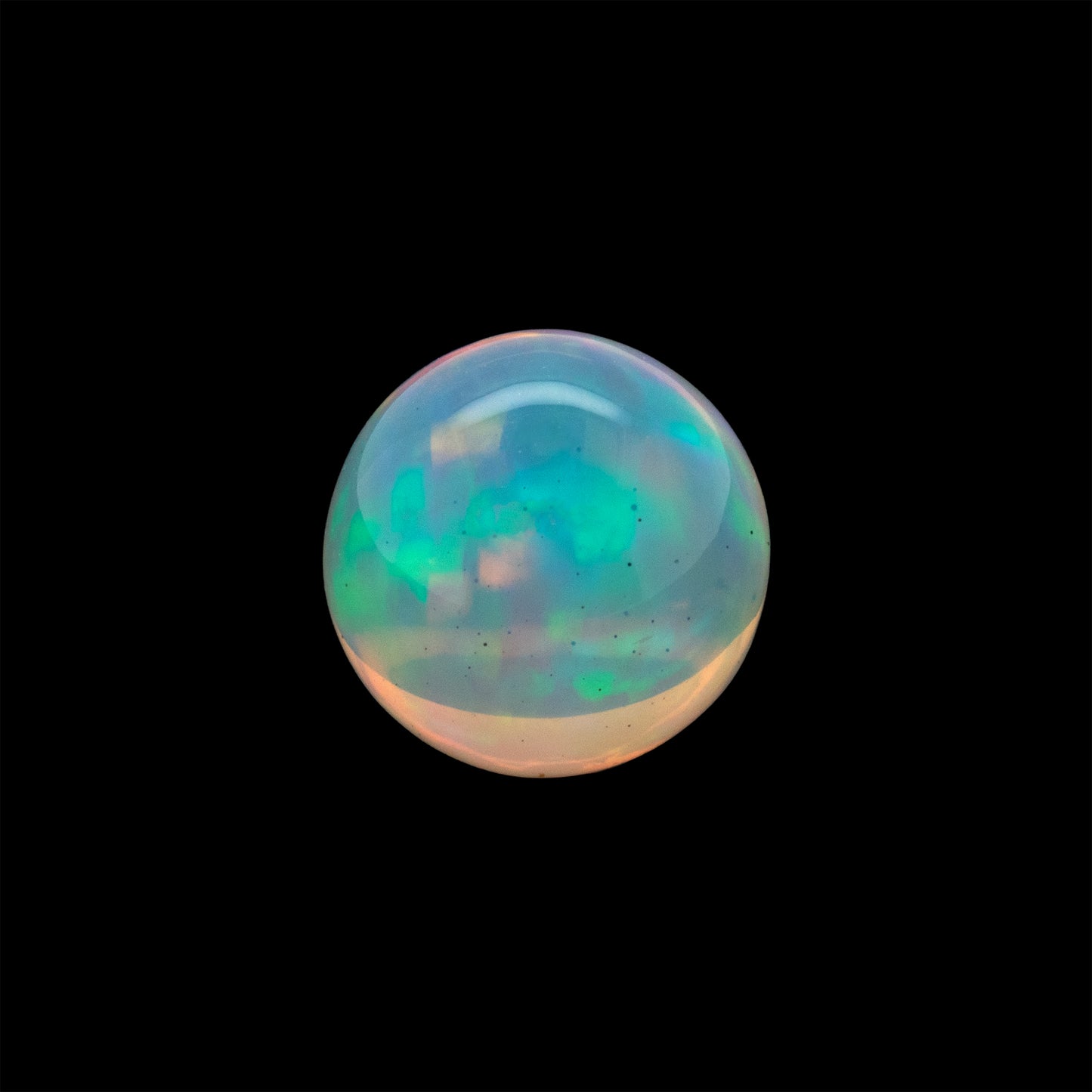 Multicolored opal gemstone on a black background
