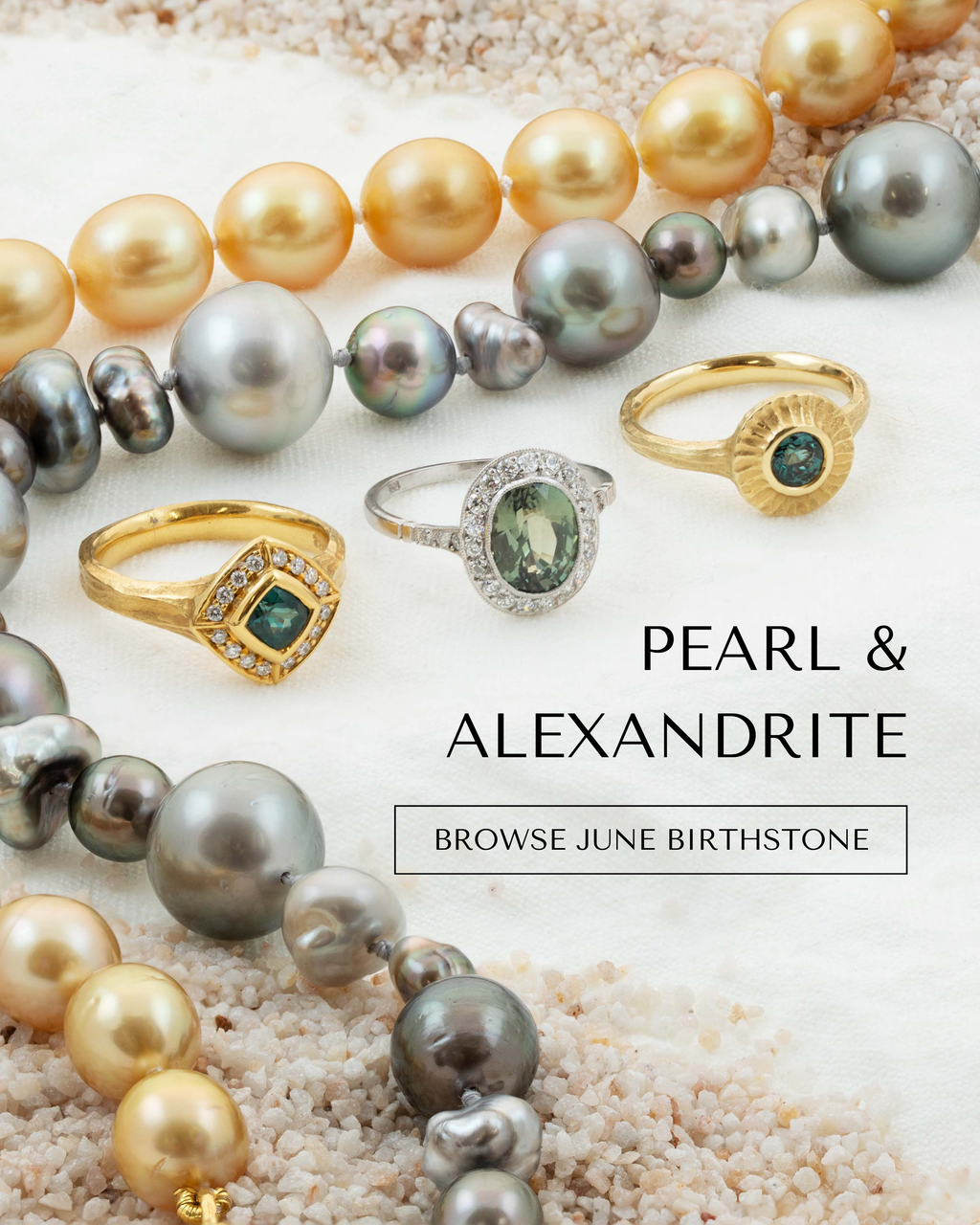 Image: Three alexandrite rings with two pearl strands on a linen surface with sand in the corners of the image. Text: PEARL & ALEXANDRITE [BROWSE JUNE BIRTHSTONE] button.