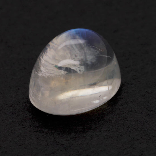 Moonstone gemstone on black background